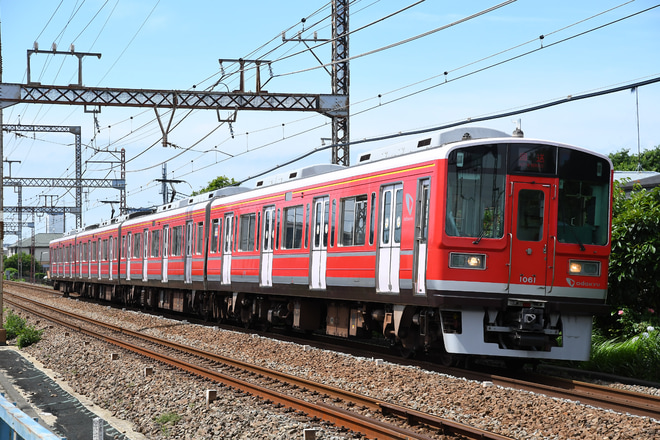 【小田急】赤い1000形1061×4(1061F)廃車回送を海老名～座間間で撮影した写真